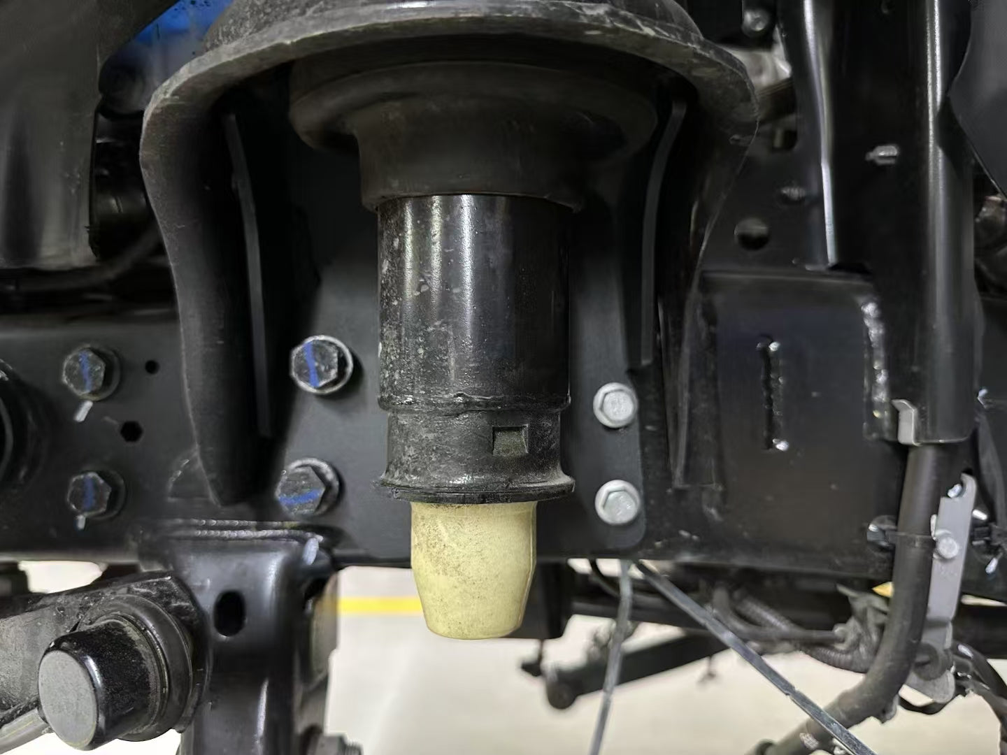 Jeep JK front spring reinforcement